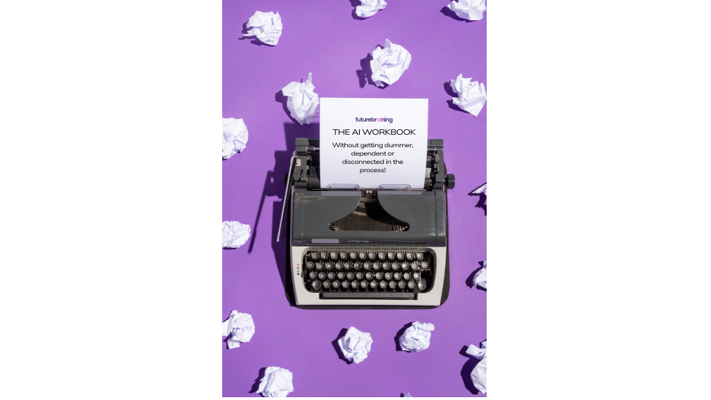 A vintage black typewriter sits centered on a bright purple background. A sheet of paper in the typewriter reads: “futurebraining — AI WORKBOOK — Without getting dumber, dependent or disconnected in the process!” Crumpled sheets of white paper are scattered around, suggesting multiple failed drafts and the persistence of revision.